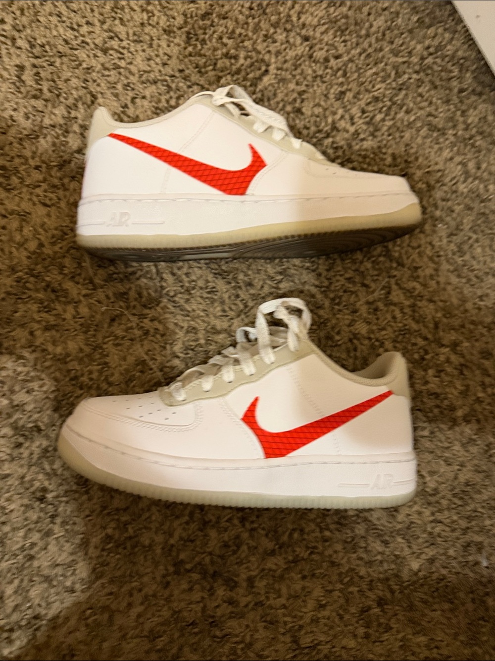 Nike White Low-Top Sneakers with Orange Swoosh